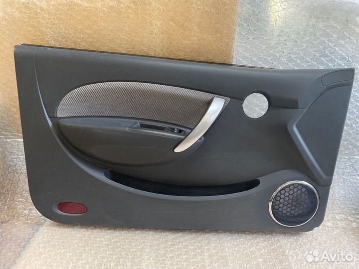 Обшивка двери передняя левая Chevrolet Aveo 2005