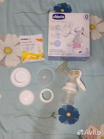 Молокоотсос ручной +бутылочка,соска,вкладыши и др