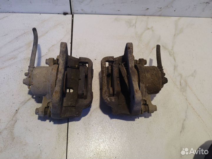 Суппорт тормозной передний BYD F3 2008 bydf3