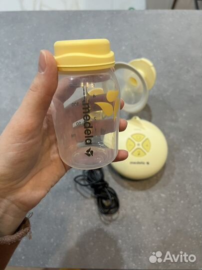 Молокоотсос medela swing