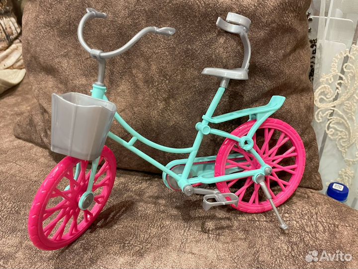 Кукла с велосипедом