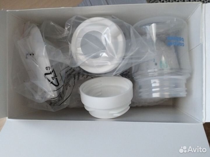 Молокоотсос электрический новый