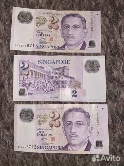 Банкнотa 2 доллaрa Cингапур