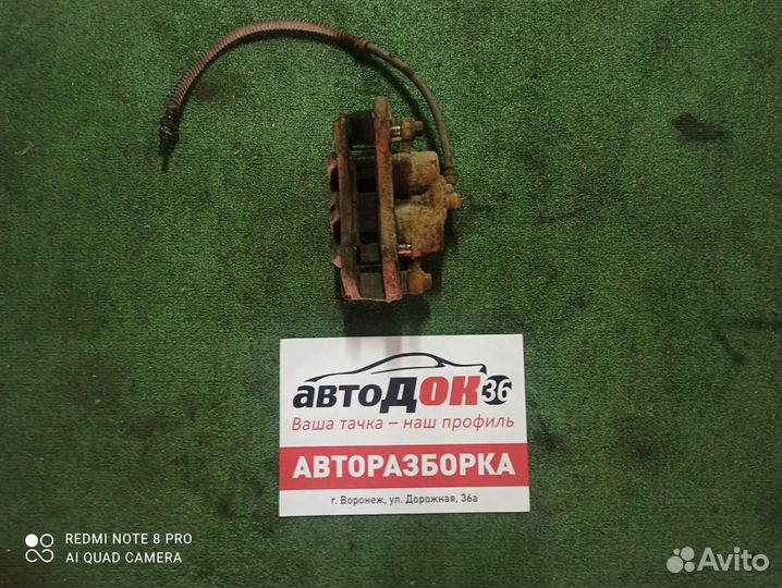 Суппорт левый передний Mitsubishi outlander 1