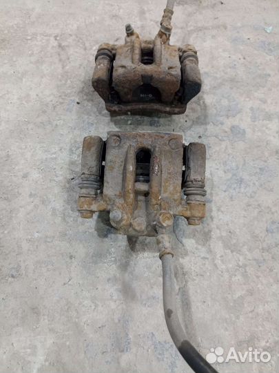 Суппорт тормозной задний Toyota Corolla 120 01-06г