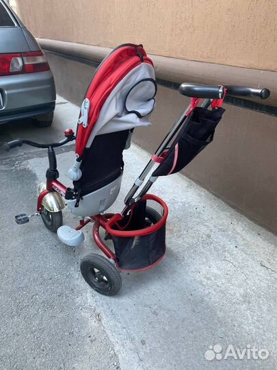 Детский трехколесный велосипед с ручкой