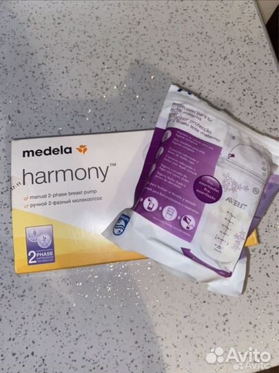 Молокоотсос medela и пакеты Avent