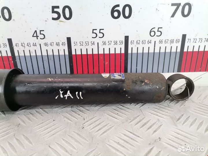 Амортизатор задний левый Renault Scenic рест. 2003