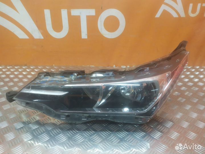 Фара левая Toyota Corolla 11 E160 E170 E180