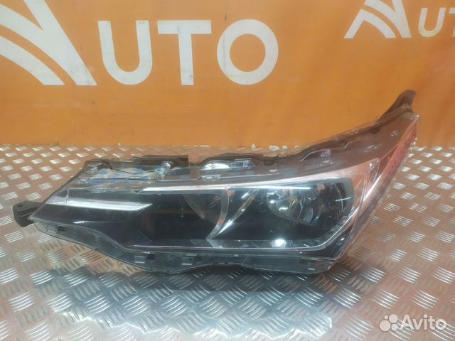 Фара левая Toyota Corolla 11 E160 E170 E180