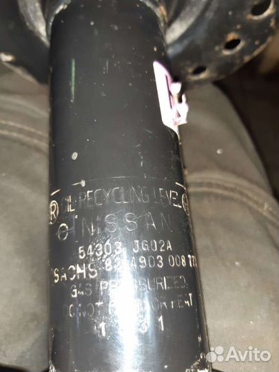 Амортизатор передний левый Nissan X-Trail T31