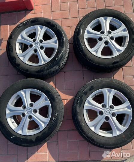 Продам колёса в сборе Мазда r 15