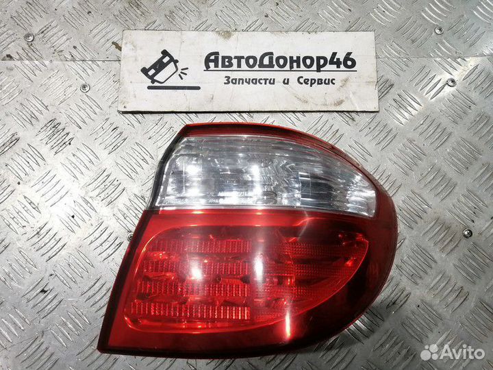 Фонарь задний правый в крыло оригинал Maxima A33