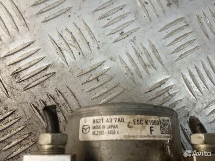 Блок управления тормозами/насос ABS Mazda Mazda3