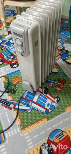 Масляный электрообогреватель