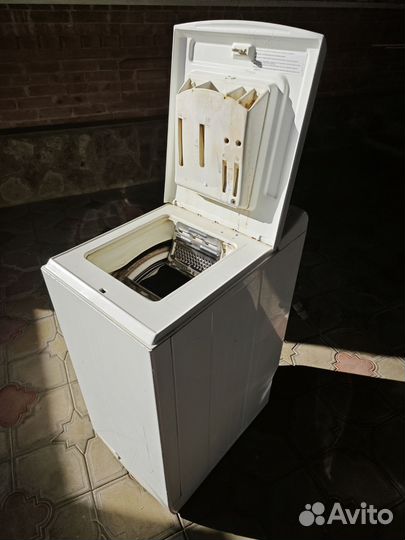 Стиральная машина с вертикальной загрузкой