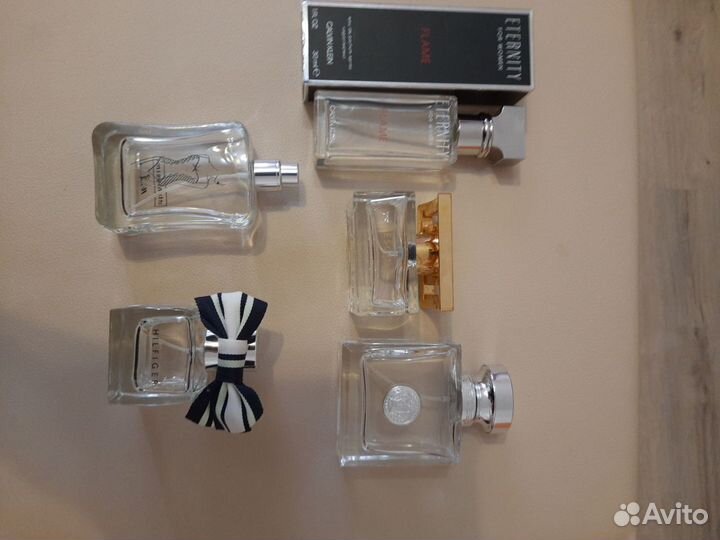 Пустые флаконы от парфюма