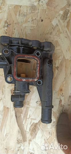 Корпус термостата Opel Astra J