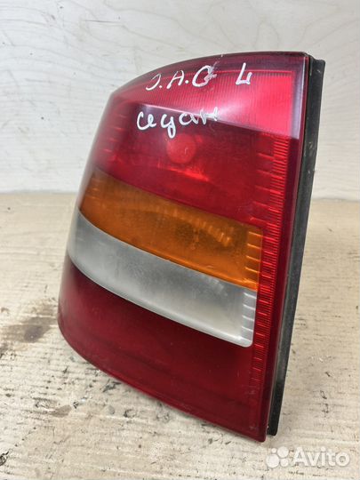 Фонарь левый Opel Astra G 1.6 X16XEL седан