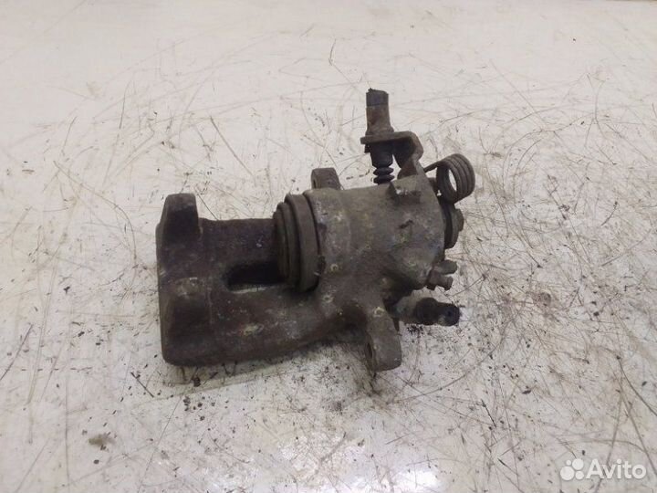 Тормозной суппорт задний левый Opel Zafira B 2008