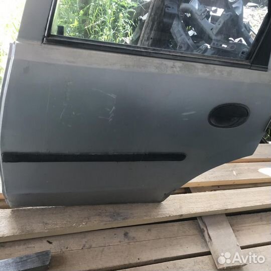 Дверь задняя левая Opel Corsa C