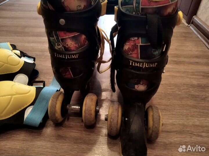 Роликовые коньки