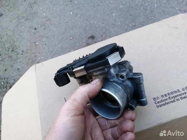 Дроссельная заслонка Opel Corsa D 1.2л