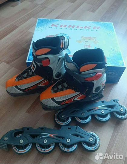 Роликовые коньки