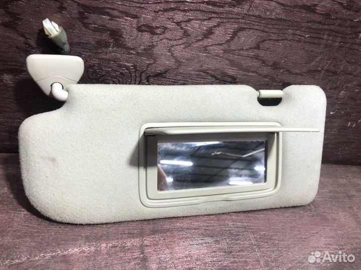 Козырек солнцезащитный передний левый Nissan