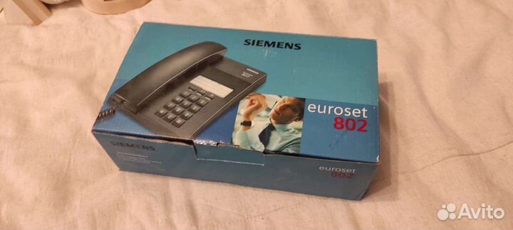 Проводной телефон