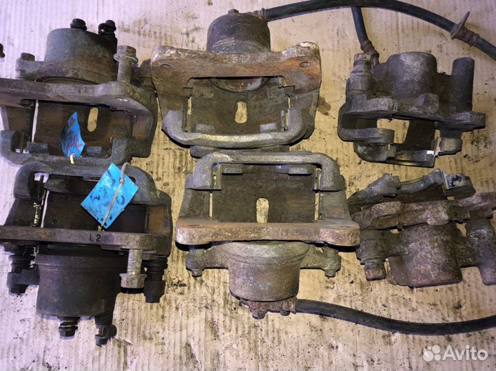 Суппорт тормозной BYD F3