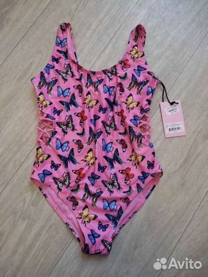 Новый фирменный купальник на девочку 146