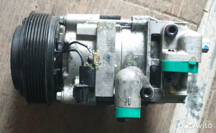 Компрессор кондиционера 977014H100 Grand Starex