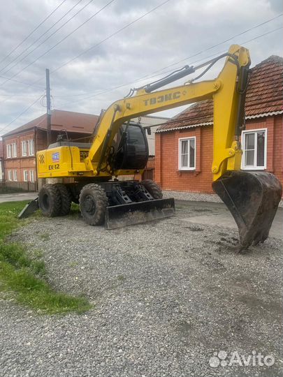 Экскаватор погрузчик