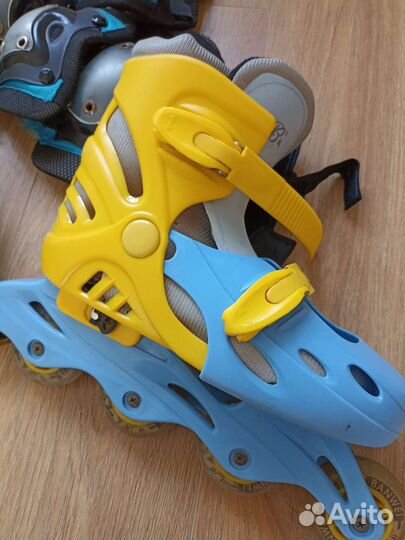 Роликовые коньки