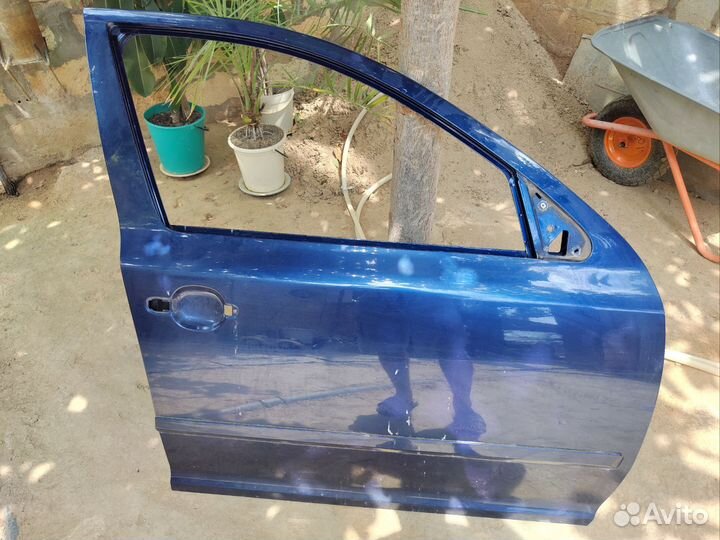Дверь правая передняя и задняя Octavia a5
