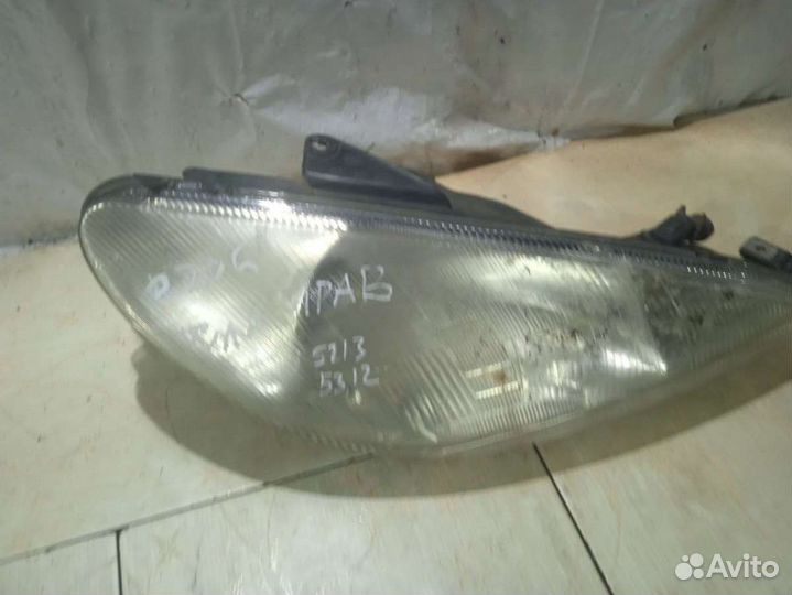 Фара правая peugeot 206 1 nn