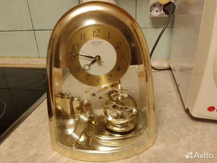 Часы золотые нарядные с вертушкой