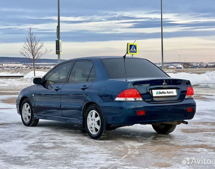 Mitsubishi Lancer 1.6 МТ, 2006, 269 099 км