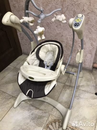 Детские электронные качели “Graco”