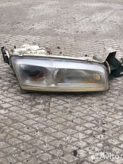 Фара передняя правая Mazda 626 GE