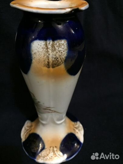 Антикварный подсвечник