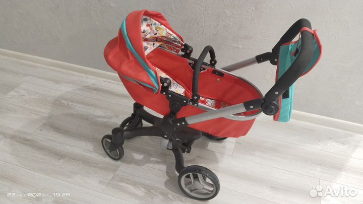 Детская игрушечная коляска