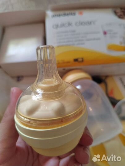 Молокоотсос medela электрический