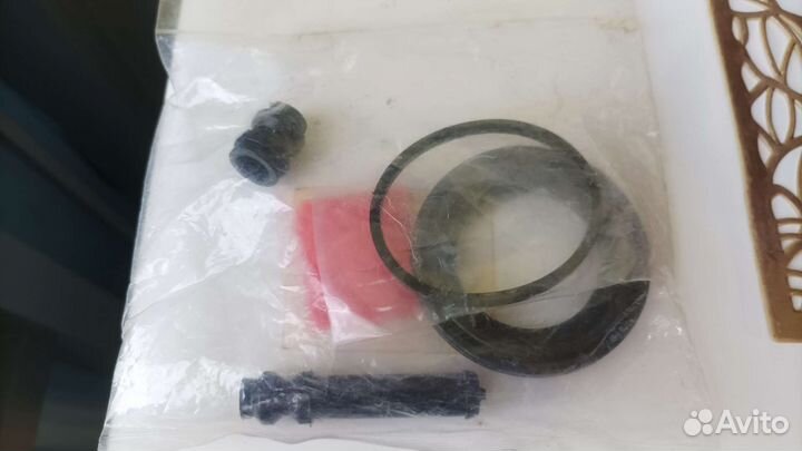 Ремкомплект суппорта тормозного MR569233