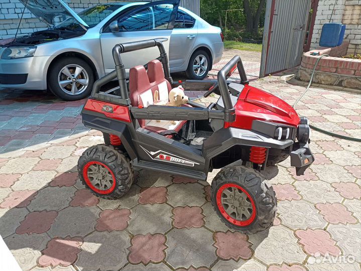 Детский электромобиль двухместный