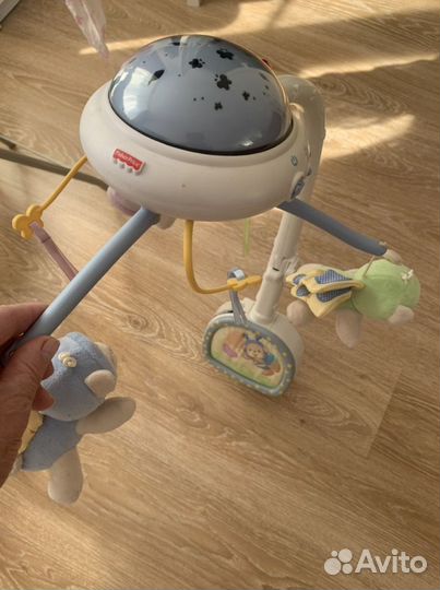 Музыкальная игрушка на кроватку