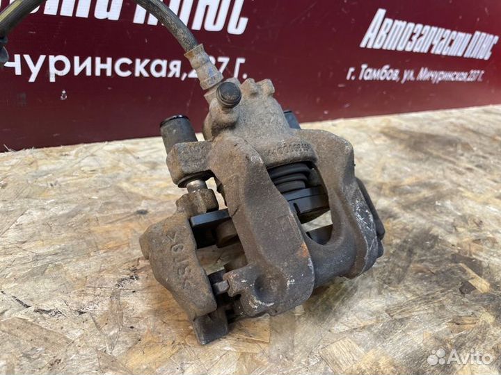 Суппорт тормозной передний правый Renault Logan