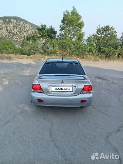 Mitsubishi Lancer 1.6 МТ, 2004, 276 000 км