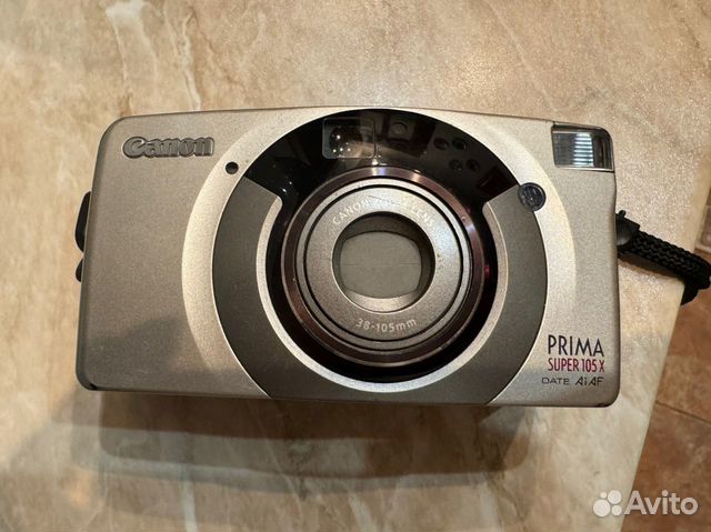 Компактный фотоаппарат canon Prima super 105x date